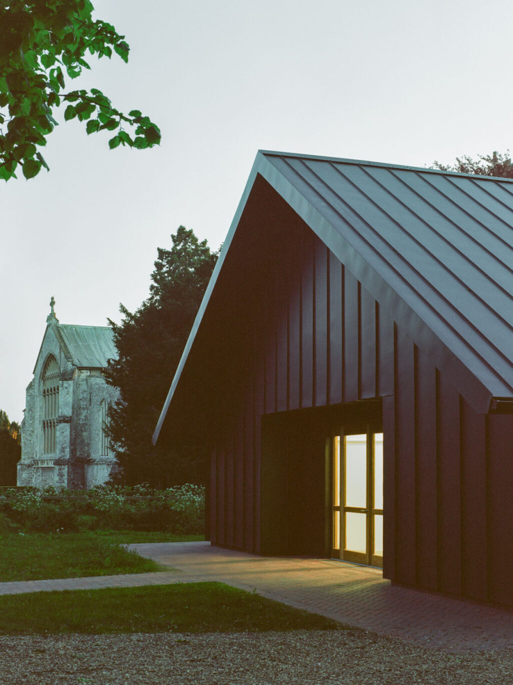 James Gorst Architects Castle Community Rooms View of main entrance and St. Michael's Church