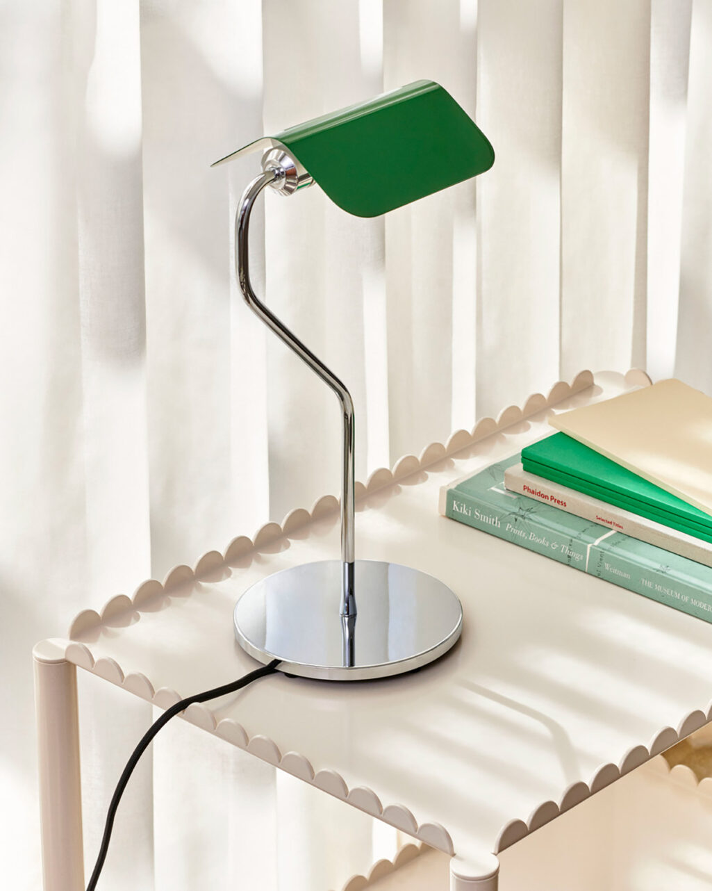 The Apex Table Lamp in Emerald Green with a round mirror polished base 